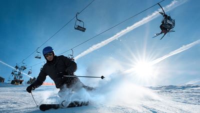 © Sportbahnen Atzmännig AG Skier on the downhill slope