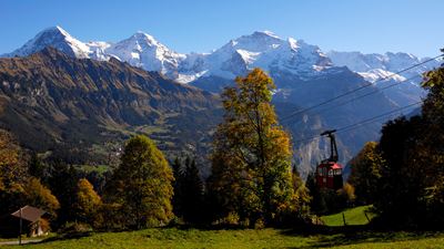 View of the Eiger, Mönch and Jungfrau. The Isenfluh-Sulwald cable car can be seen in the background.