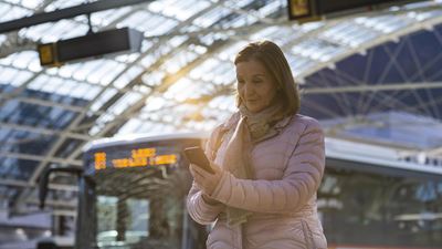 A person buying a ticket on their smartphone.